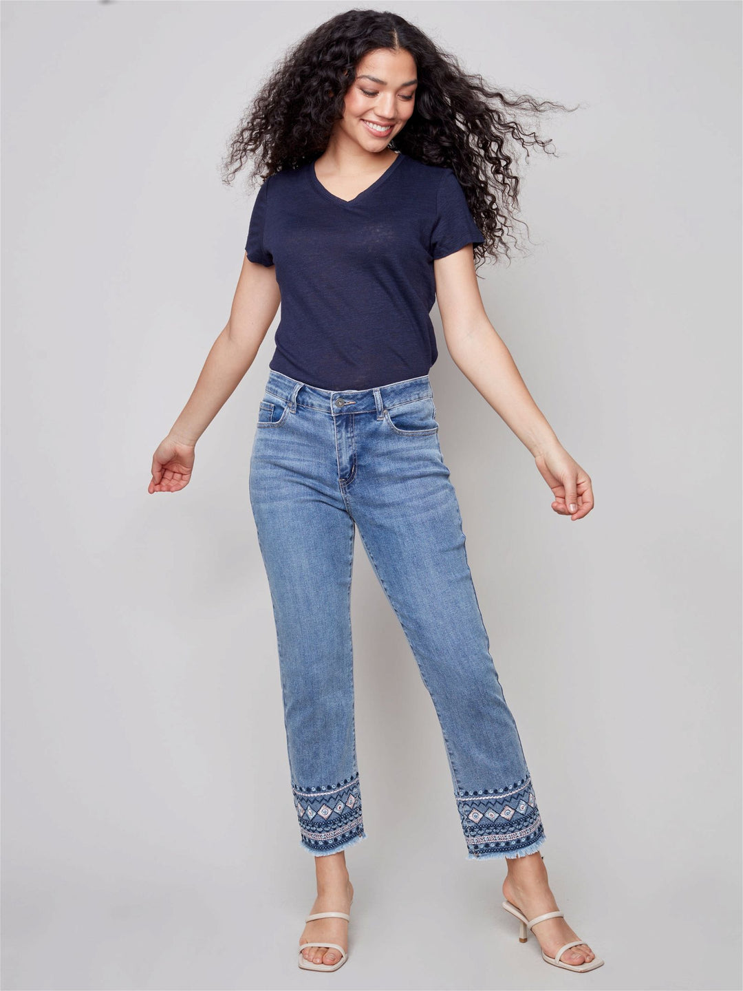 Jeans with embroidered hem online